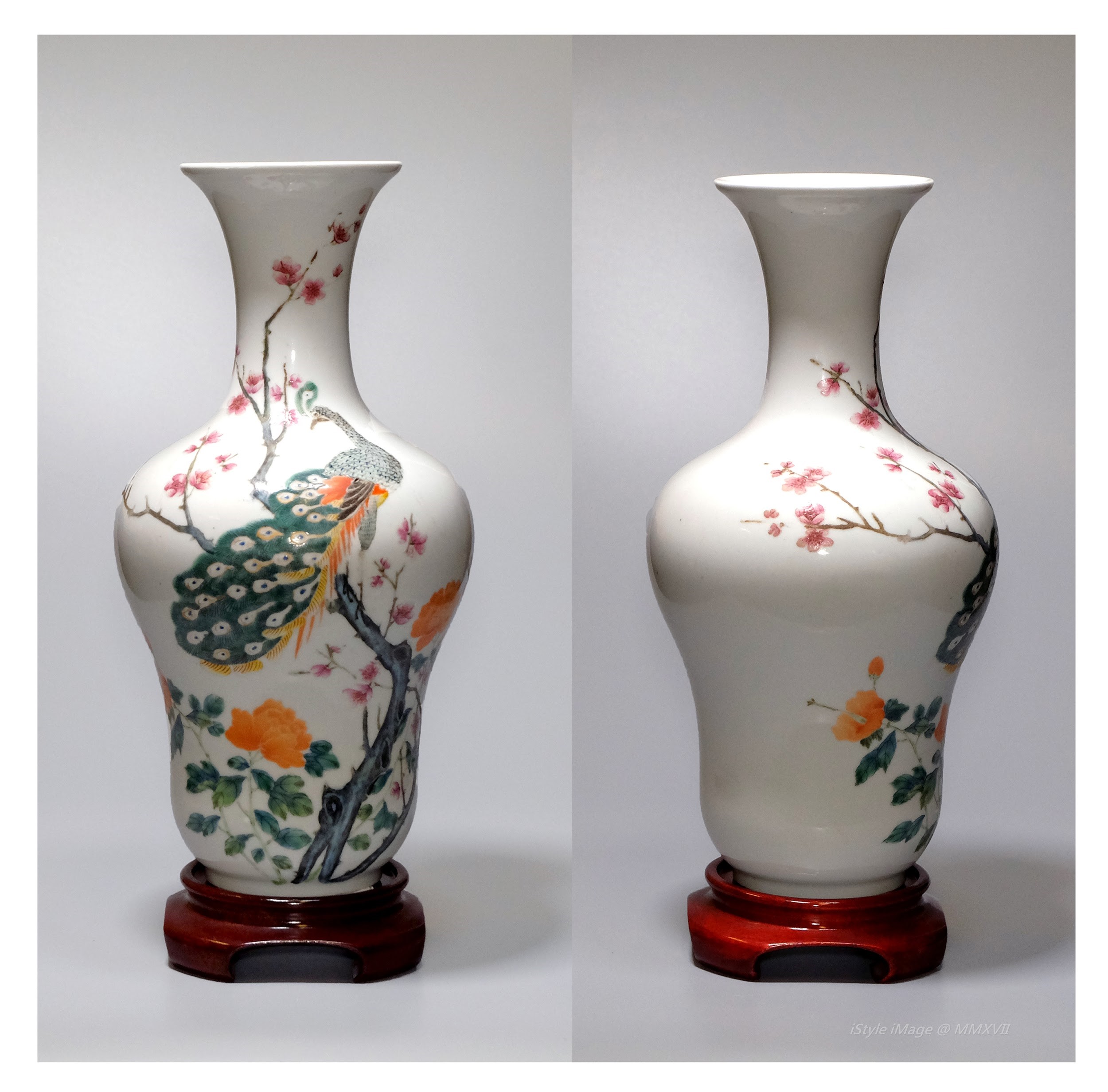 <br><h4>Lot 7 : An exquisite elegance pear-shaped form famille-rose vase  ( early Republic )</h4>
				  A pear-shaped form vase, the globular body gently sloping to an elegant slender neck, brilliantly enamelled with a peacock with blossoming flowers.  The base glazed inscribed with three character '[ū rén tang].
					<br>Measurements (H) high 27.5 CM, (W)width 13.5 CM<br><br><br>梨形粉彩花瓶  ( 民國早期 )<br>梨形花瓶球體輕輕上升到優雅細長的頸部，燦爛地繪上孔雀與朵朵鮮花。底款[居仁堂]<br>尺寸(H)高 27.5 厘米,  (W)濶13.5 厘米