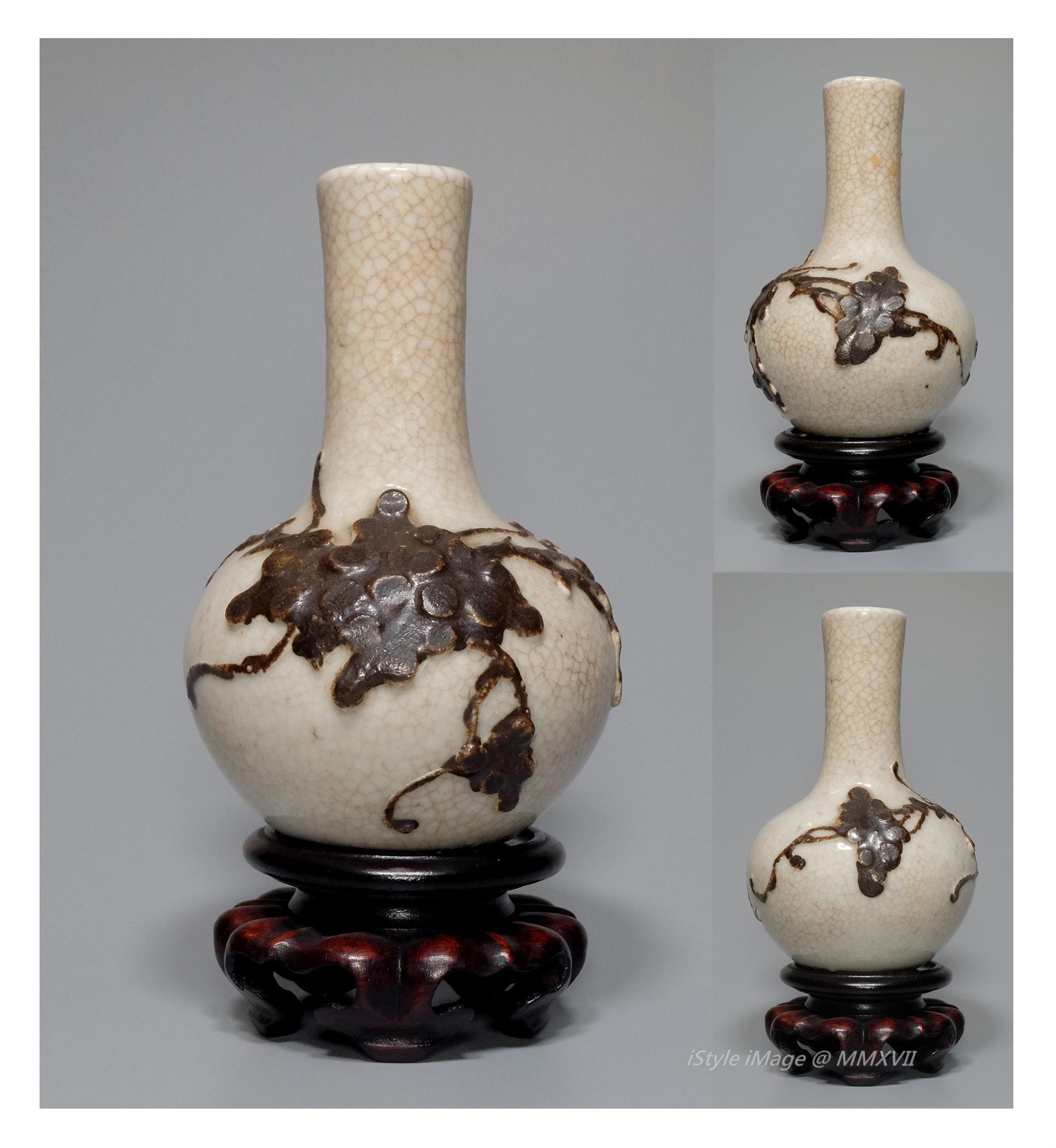 <br><h4>Lot 27 : An exceptional Yuan style vase  (40's last century )</h4>
					The pear shaped vase, rising from a short tapering foot to globular ribbed body then rising to a tall waisted cylinder neck, covered overall in an ivory glaze suffused with a network of crackle, contrasting with slip-decorated deep brown flowering branches on the exterior globular body. 
					<br>Measurements (H) high 10 CM, (W)width 6.5 CM<br><br><br>罕有的元代風格花瓶  ( 上世紀四十年代 )<br>梨形花瓶，從一個短錐形的腳上升到球體瓶身，然後升起到一個高腰的圓柱頸部，整體覆蓋著象牙色的壁裂釉，深棕色開花枝裝飾在球體外部。<br>尺寸(H)高 10 厘米,  (W)濶6.5 厘米 
