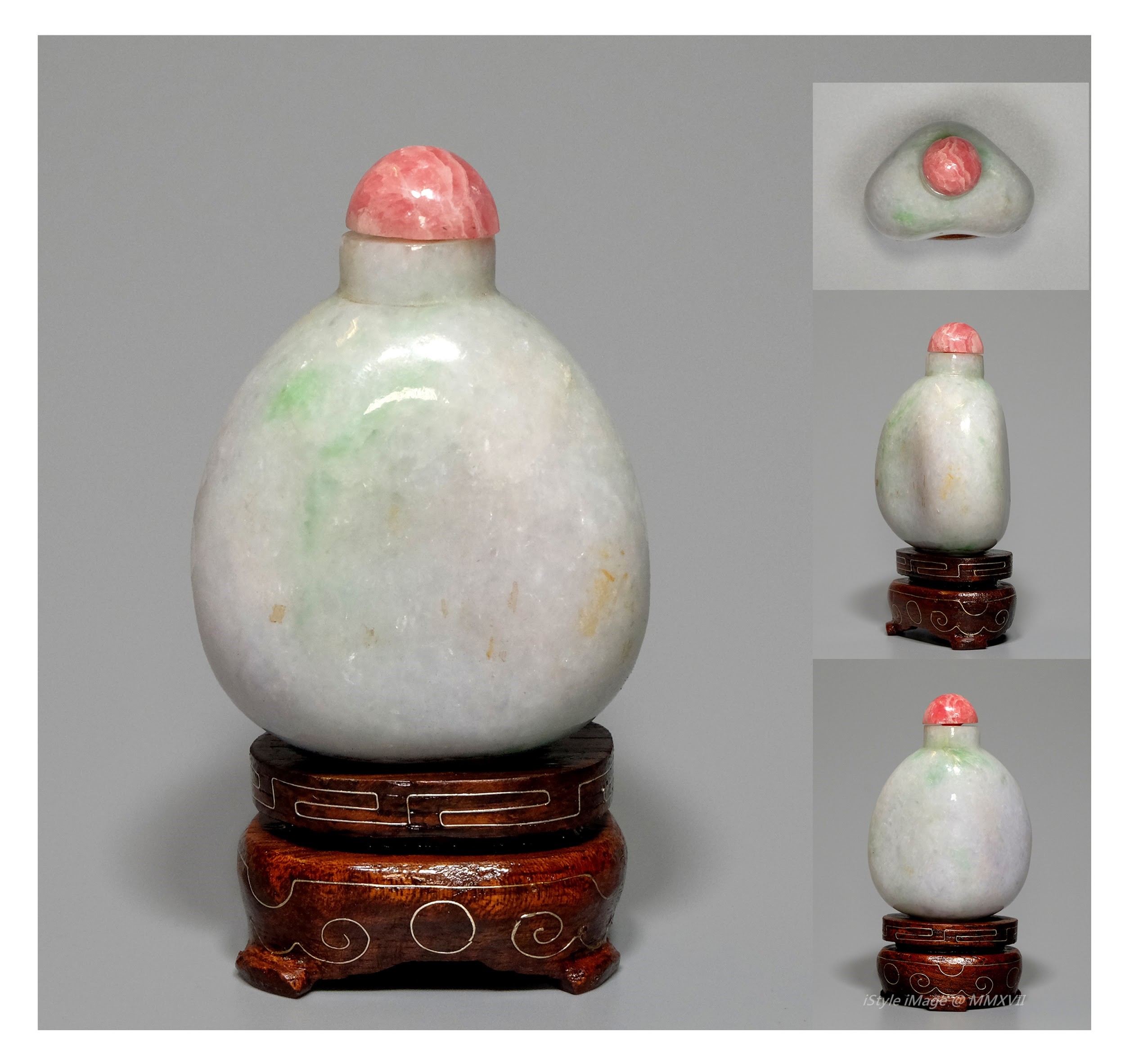 <br><h4>Lot 68 : A rare flattened heart-ovoid shaped white tone lavender apple green jadeite snuff bottle  ( Republic period )</h4>
							This rare flattened heart-ovoid shaped white tone jadeite with charming lavender apple green highlight. Intense pink tourmaline stopper, and spoon. 
							<br>Measurements (H) high 6.5 CM, (T) thick 2.7 CM, (W)width 4.5 CM<br><br><br>罕見扁平卵形／側面心形白底翡翠綴薰衣草蘋果綠色煙壺(民國時期)<br>這罕見的扁平卵形而側面心形白色翡翠，帶有迷人的薰衣草蘋果綠色。 配彩粉紅色電氣石塞勺子。<br>尺寸(H)高6.5 厘米, (T)深 2.7 厘米, (W)濶4.5 厘米