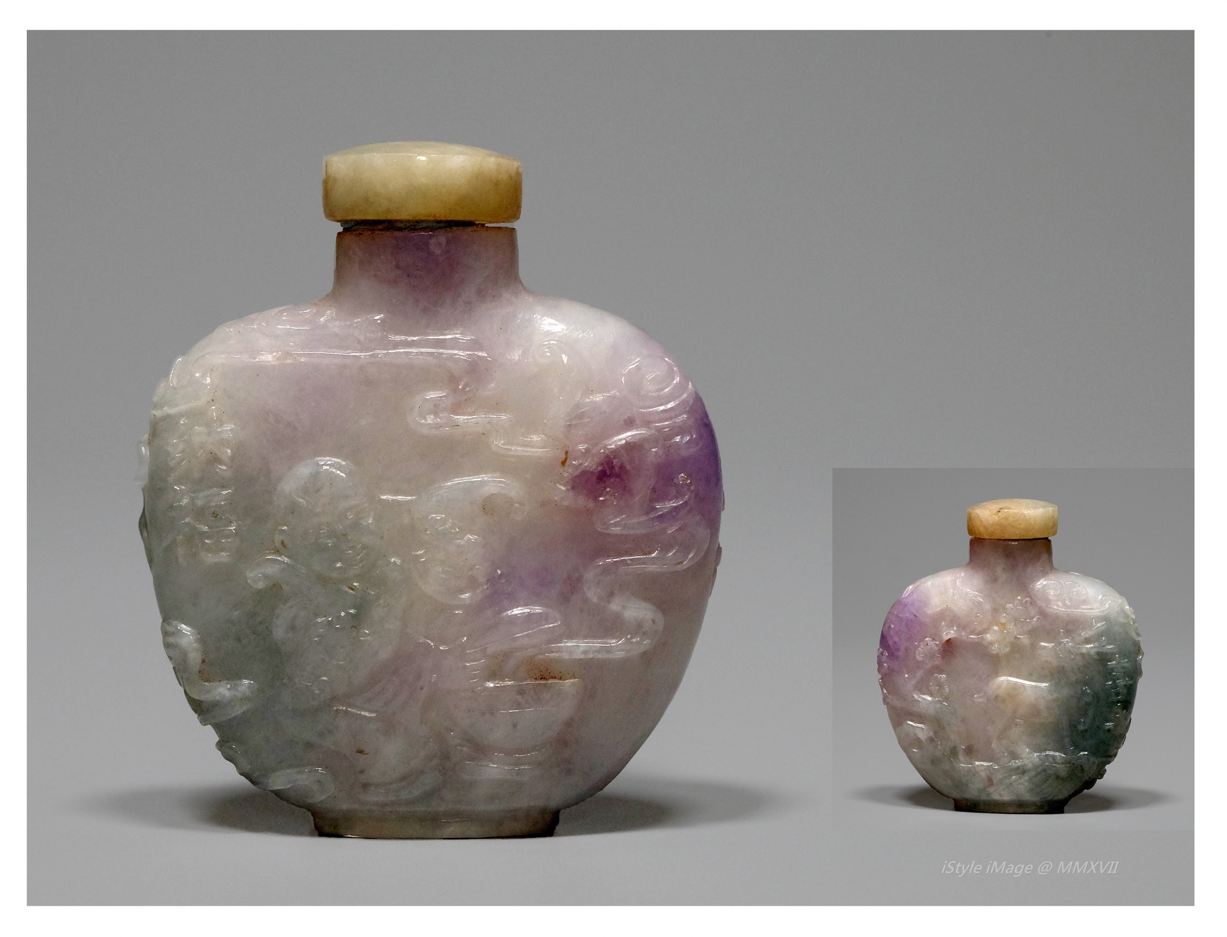 <br><h4>Lot 69 : A very beautiful and charming purplish-lavender colour jadeite with 'Nàfú ' (to receive blessings) characters snuff bottle ( Republic period )</h4>
							This attractive jadeite snuff bottle of variegated intense purple and lavender colours, carved a chilong on one side, and craved 'Nàfú ' (to receive blessings) characters on another side.  Lavender jadeite stopper, spoon missed.
							<br>Measurements (H) high 6CM, (T) thick 0.8CM, (W)width 5CM<br><br><br>非常妙麗迷人的薰衣草紫色翡翠雕刻 '納福和龍子' 煙壺 ( 民國時期 )<br>這吸引的翡翠鼻煙壺有色彩斑斕的紫色和薰衣草色，一邊雕刻了螭龍 (龍子)，另一邊雕刻了'納福'字。 配薰衣草翡翠塞，沒有勺子。<br>尺寸(H)高6 厘米, (T)深 0.8  厘米, (W)濶5 厘米