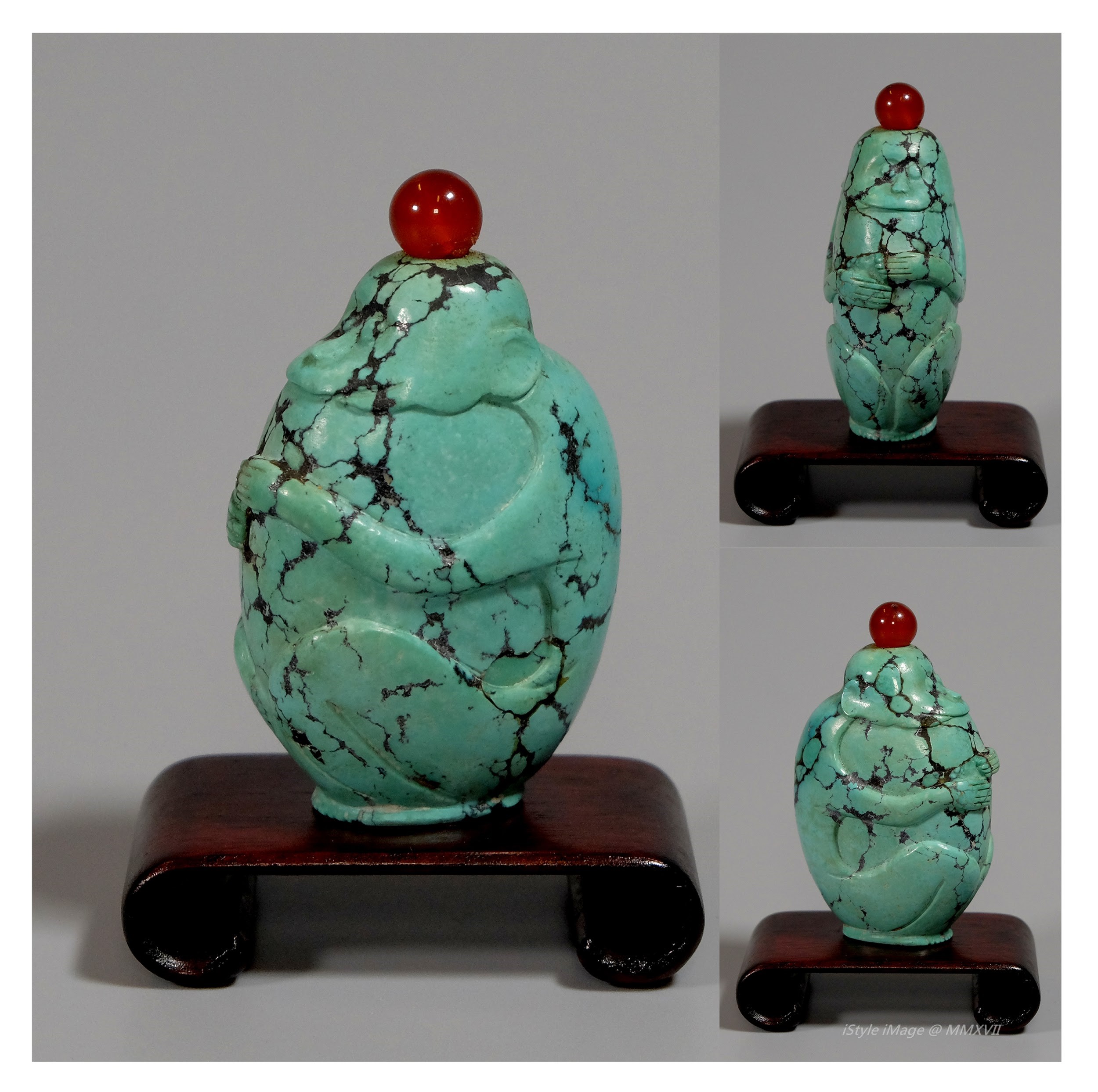 <br><h4>Lot 78 : An interesting and rare monkey turquoise snuff bottle ( Qing dynasty )</h4>
							This interesting and rare monkey shaped turquoise snuff bottle craved skillfully utilised the active monkey. With red agate stopper but not function well.
							<br>Measurements (H) high 5.5CM, (T) thick 2CM, (W)width 3.3CM<br><br><br>奇趣罕見的綠松石猴子煙壺  ( 清朝 )<br>這奇趣罕見的猴形綠松石鼻煙壺，巧妙立體地雕刻出活躍的猴子。 紅瑪瑙塞，但不能用。<br>尺寸(H)高 5.5 厘米, (T)深 2 厘米, (W)濶3.3 厘米