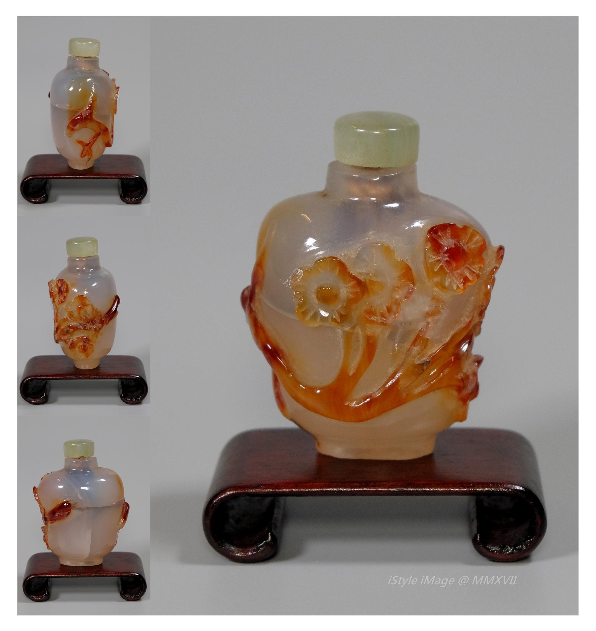 <br><h4>Lot 80 : An elegant agate snuff bottle ( Republic period )</h4>
							Of flattened ovoid form intricately carved through the orangey agate skin with flower branches. With melon green stopper, and spoon. [minor flaws on body] 
							<br>Measurements (H) high 5 CM, (T) thick 2.5 CM, (W)width 4 CM<br><br><br>優雅的瑪瑙煙壺  ( 民國時期 )<br>扁平的卵形壺身通過橙色瑪瑙皮雕刻成花枝。 淺綠色玉塞子和勺子。 壺身有小缺陷<br>尺寸(H)高 5 厘米, (T)深 2.5 厘米, (W)濶 4 厘米