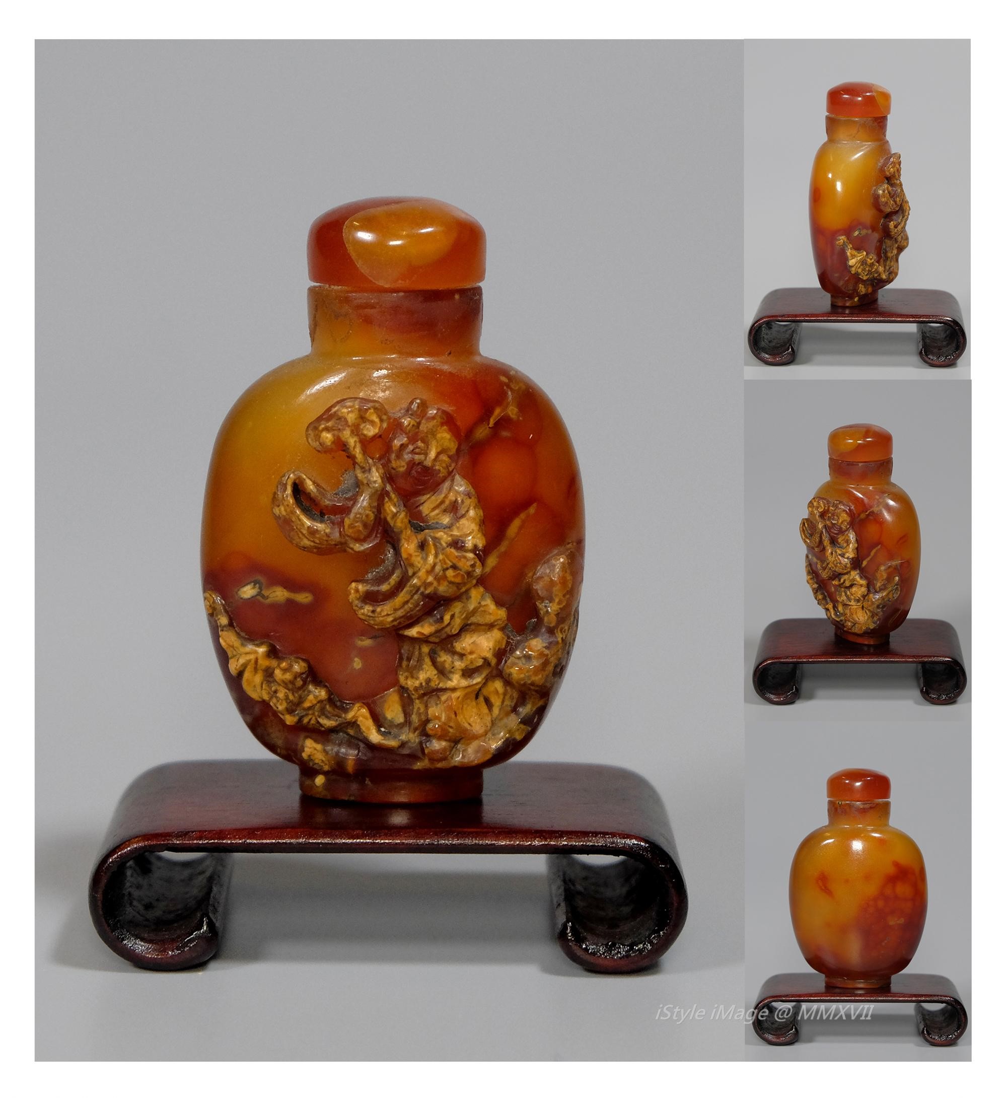<br><h4>Lot 81 : A fine yellow agate snuff bottle ( Qing dynasty )</h4>
							This fine yellow agate was cleverly using the intense brown colour agate skin carved in relief and pierced to one side with an immortals with his lingzhi standing on the cloud scroll. With match colour agate stopper, and spoon.
							<br>Measurements (H) high 5.5 CM, (T) thick 2 CM, (W)width 3 CM<br><br><br>精美的黃色瑪瑙煙壺 ( 清朝 )<br>這精美的黃色瑪瑙巧妙地用棕色的瑪瑙皮，用浮雕，在壺的一面雕刻持靈芝的仙翁在雲中望向人間。 配同色瑪瑙塞和勺子。<br>尺寸(H)高 5.5 厘米, (T)深 2 厘米, (W)濶3 厘米