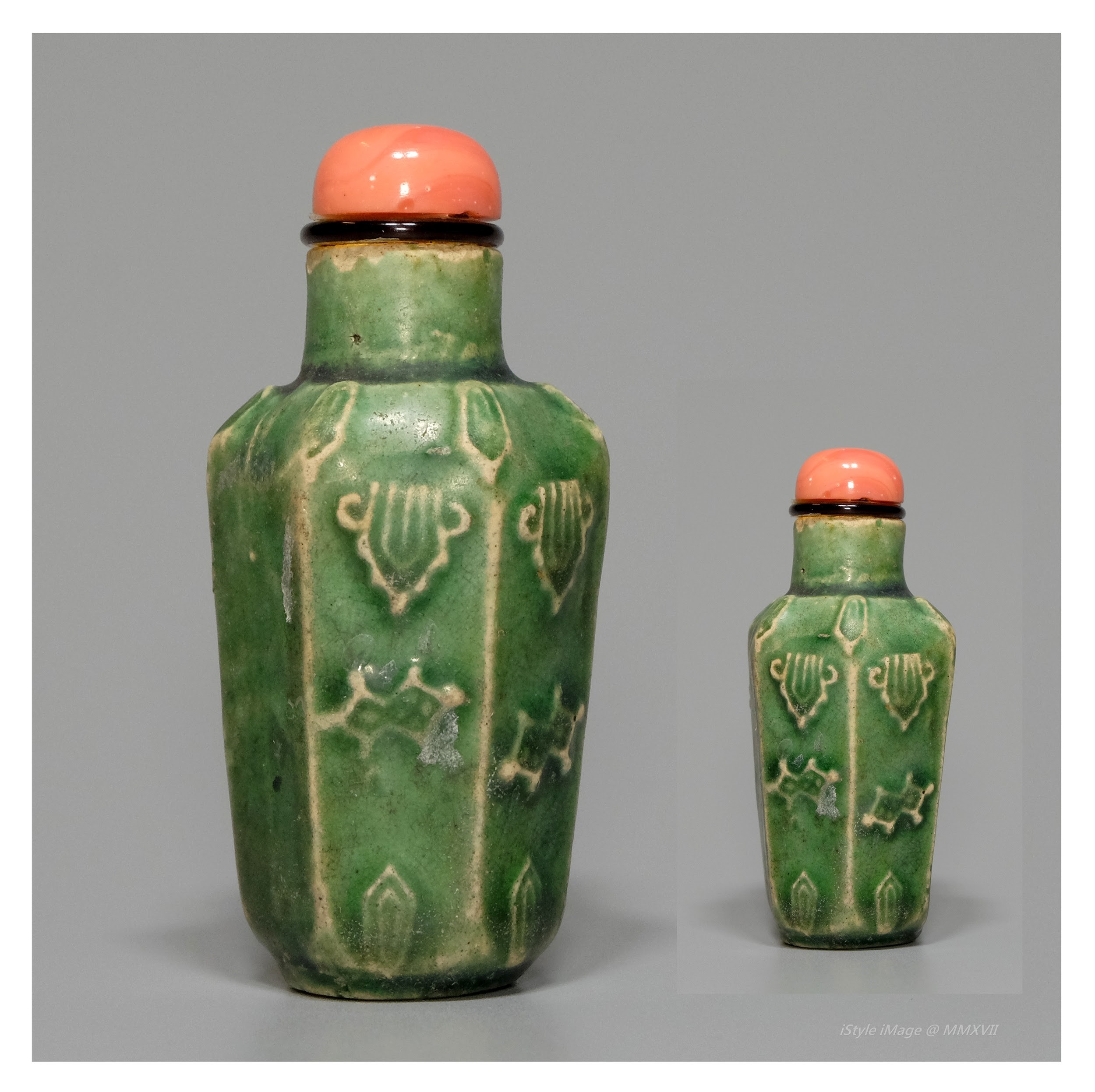 <br><h4>Lot 98 : A special green-glazed hexagonal snuff bottle  ( Republic period )</h4>
							This special hexagonal shaped green-glazed with lotus scrolls and lappet all around each panels. With coral glass stopper, and spoon.
							<br>Measurements (H) high 6.5 CM,  (W)width 3 CM<br><br><br>特式的綠釉六角形煙壺 ( 民國時期 )<br>這特式的六角形壺，綠釉蓮花捲軸和錐形花在周圍。配珊瑚玻璃塞和勺子。<br>尺寸(H)高 6.5 厘米, (W)濶 3 厘米